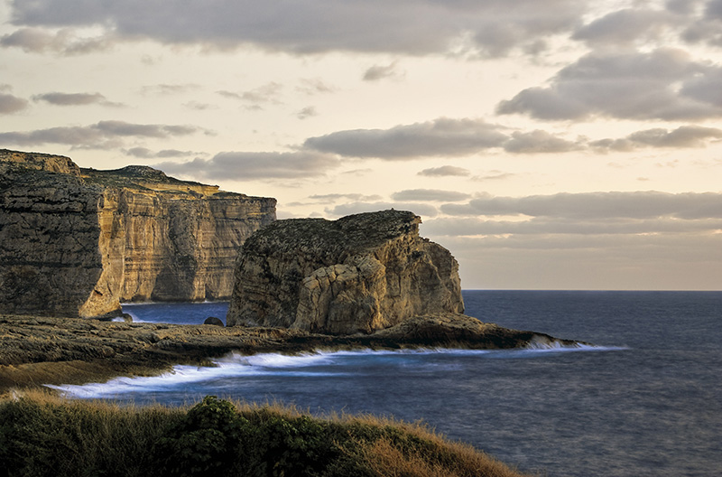 The Fungus Rock located in the North of Gozo gets its name from the important medicinal fungus which was found growing on it, way back in time, when the Knights of St. John ruled the islands. © Clive Vella